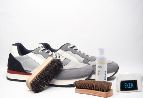 stock-photo-sneakers-with-shoe-care-products-and-accessories-on-a-white-background-2403237463.jpg